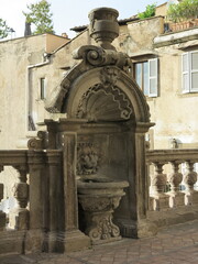 Fototapeta na wymiar Viterbo Town Hall Courtyard Sculpted Fountain Close Up, Italy