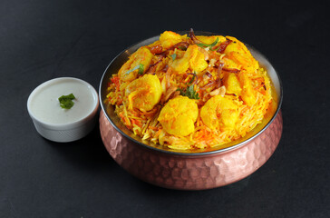 Shrimp Biryani seafood Rice yellow Arabic meals lunch black background 