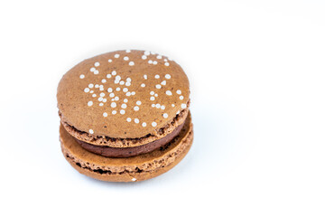 Chocolate macron on a white background. High quality photo with room for your copy.