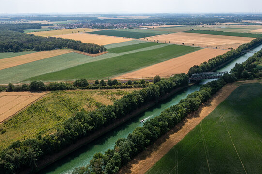 Aerial view of the Mittelland Canal near Peine, surrounded by agricultural fields and rural landscape in Lower Saxony