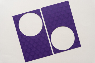 two simple purple cards with dot patterns and circle frames on blank paper