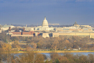 Fototapeta na wymiar Washington DC skyline during autumn season - The major Monuments and Capitol building in the view