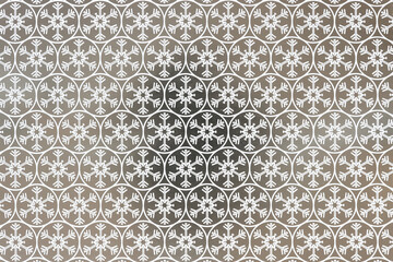 holiday themed scrapbook paper background: snowflake pattern embedded within an ornate silver ground