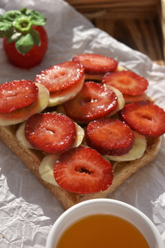Close up strawberry and banana toast