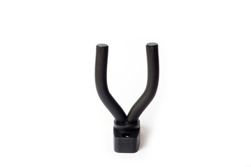 Wall mount for an acoustic or electric guitar, shot against a white background.