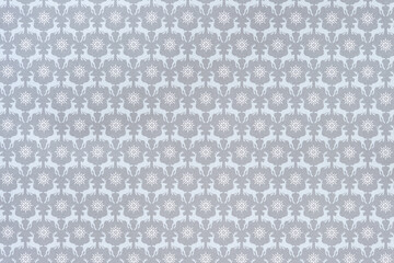 holiday themed scrapbook paper background: snowflakes set within an ornate design pattern