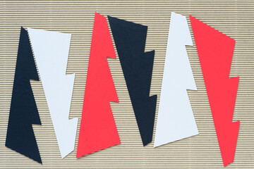 zig zag edged paper shapes on corrugated paper
