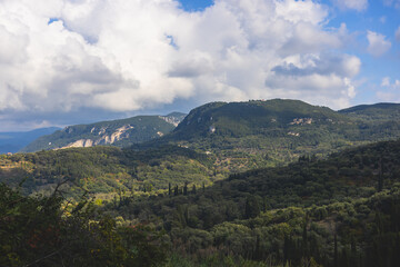 Beautiful green landscape of Corfu island, Greece, with mountains and trees, Kerkyra, Ionian islands, summer sunny day