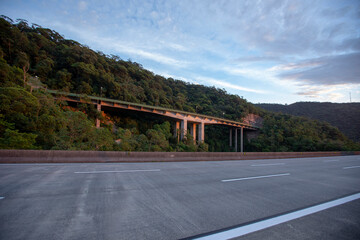 Naklejka premium View of the section of the Imigrante Highway that connects Sao Paulo to the city of Santos on the coast. Brazil. No cars