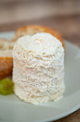 Cheese collection, French soft Chabichou of Poitou cheese made from goat milk in region Nouvelle-Aquitaine, France