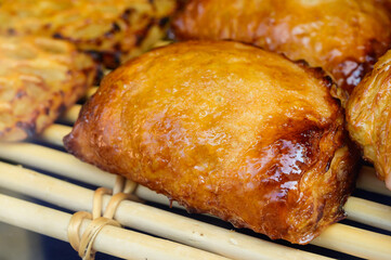 French bakery, fresh baked sweet buns and rolls on display in small French bakery in Paris