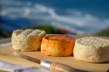 Variety of goat, sheep, cow cheeses made with paprika, herbs in Portugal