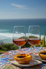 Portugal's traditional food and drink, glasses of porto wine or muscatel de setubal and dessert...