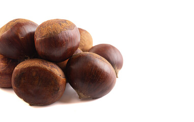 Pile of Raw and Whole Chestnuts Isolated on a White Background