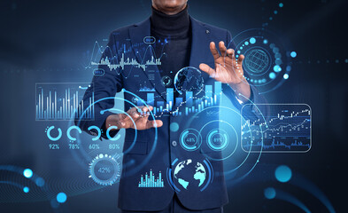 African businessman working with forex statistics on a virtual screen