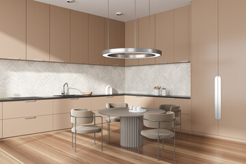 Stylish kitchen interior with seats and eating table on hardwood floor