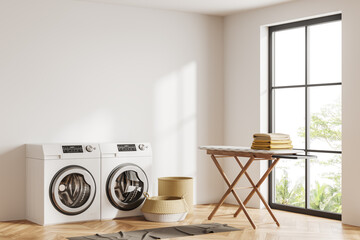 Light laundry interior with washing machine and window. Mock up empty wall - obrazy, fototapety, plakaty