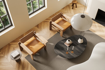 Top view of light chill interior with couch, armchair and window