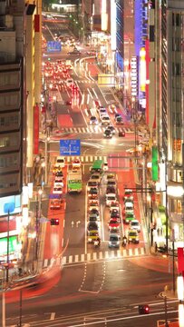 Time lapse of traffic on a busy street in the Shinjuku ward of Tokyo.