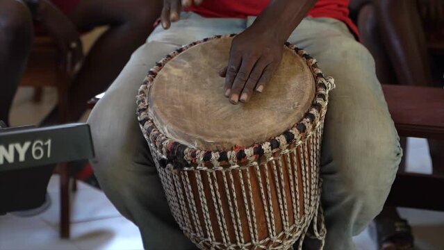 African man playing drums