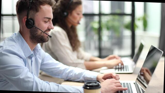 Guy from technical customer service support answering voice calls from clients in office
