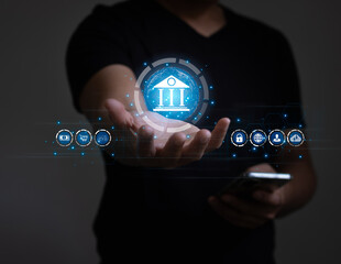 Cyber security concept. Businessman holding online banking icons and network connection icons with smartphone. Bank safety and protection of personal and financial data. Digital technology business.