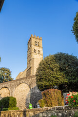 Fototapeta na wymiar Barga, Italy. The bell tower of the Cathedral Church of St. Christopher (Collegiata di San Cristoforo)