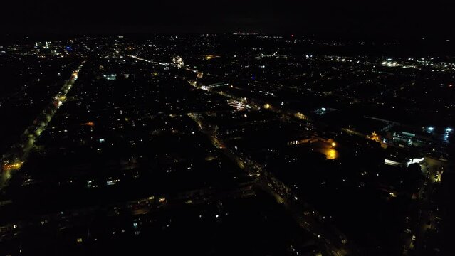 Happy New Year 2023. New Year's Live Fireworks at Night. Aerial Footage of City with Drone's Camera. The Footage was Captured just at Date Changed after 12AM of Midnight over Luton Town of England UK
