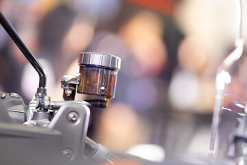 Close-up of motorcycle brake fluid container brake pump oil storage