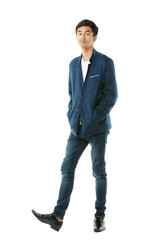 Full-body portrait of an early teenage boy. Smart, slim, tall Asian man in casual clothes walking elegantly on white background. Image for product advertisements, teenage lifestyles. - 557633032