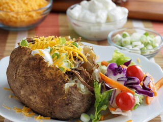 Stuffed Potatao with Side Salad and Toppings