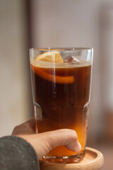 Glass of americano mixed with orange juice