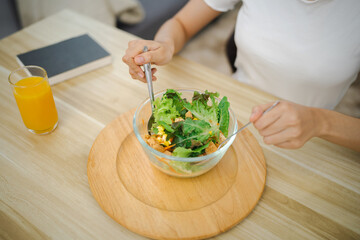 Asian woman dieting Weight loss eating fresh fresh homemade salad healthy eating concept
