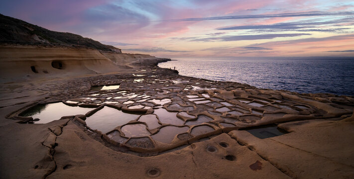 Salt Pans on the island of Gozo in Malta at sunset