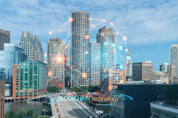 Panoramic picturesque city view of Boston Harbour at day time, Massachusetts. Building exteriors of financial downtown. Technological, educational center. Blockchain and cryptography concept, hologram