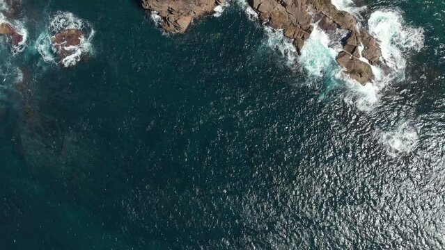 Drone video flying over Barry Park lookout toward Fingal Head on a bright spring day