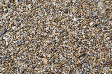 Smooth round pebbles on the beach in Bangkalan, Madura, Indonesia.