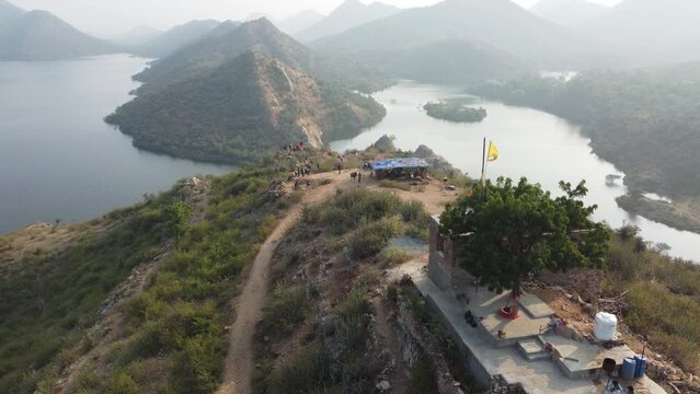Bahubali Hills, Udaipur, Rajasthan, India 28th December 2022: Popular prewedding destination and trekking spot near Udaipur. 4k Aerial view of Bahubali hill and Badi lake near Barda village