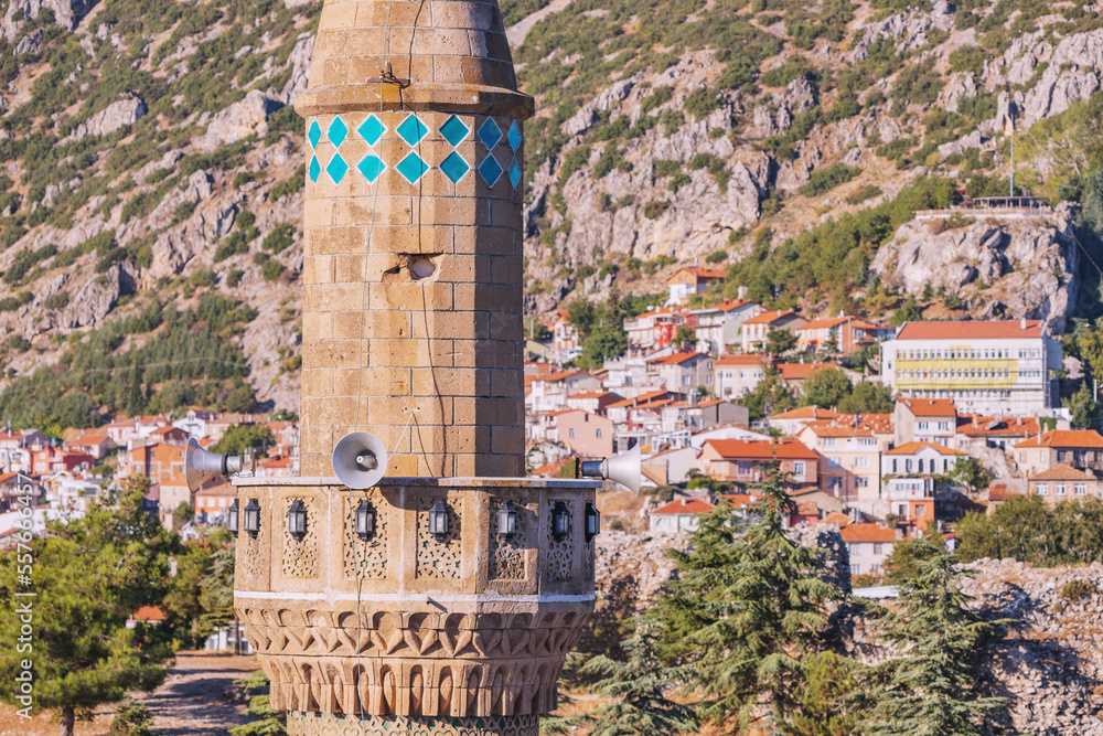 Wall mural Aerial view over rooftops and mosque minaret in Egirdir, Isparta province in Turkey. Travel sightseeing and religious tourism.