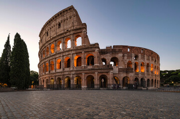 Fototapeta na wymiar Roman Colosseum before sunrise, Rome, Italy