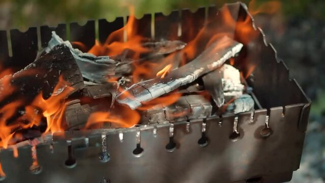 bonfire flames on brazier . barbecue grill