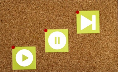 Music symbols on sticky papers on note board