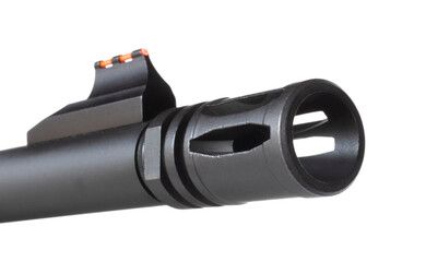 Rifle muzzle with a flash hider and red sight