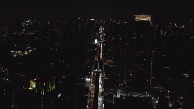 Night scene of Sukhumvit in Bangkok, the capital of Thailand. City landscape. Business city. Business travel. Colorful sunset. city skyline 4K. Cityscape skyline. Aerial view of skyline of BTS line.