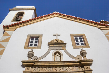 Front facade of the historic Espirito Santo church in Marvao, Portugal
