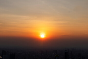 Fototapeta premium Sunset in the evening in a large metropolis,Gorgeous panorama scenic of the sunset with cloud, No focus, specifically.