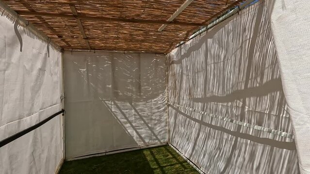 A white building of a public Sukkah, before the Sukkot holiday, in Ein Hamad Park in Jerusalem