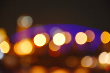 blurry light of bridge on river in night background and texture  