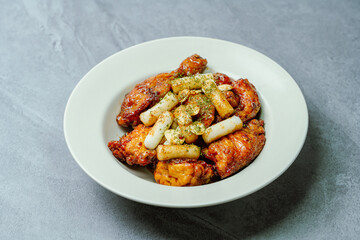 yangnyeom chicken, Korean Seasoned Fried Chicken : This dish is seasoned chicken cut into pieces, deep- fried, and mixed with soy sauce, gochujang, or other sauces. It has a mild yet spicy taste that 