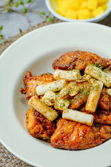 yangnyeom chicken, Korean Seasoned Fried Chicken : This dish is seasoned chicken cut into pieces, deep- fried, and mixed with soy sauce, gochujang, or other sauces. It has a mild yet spicy taste that 